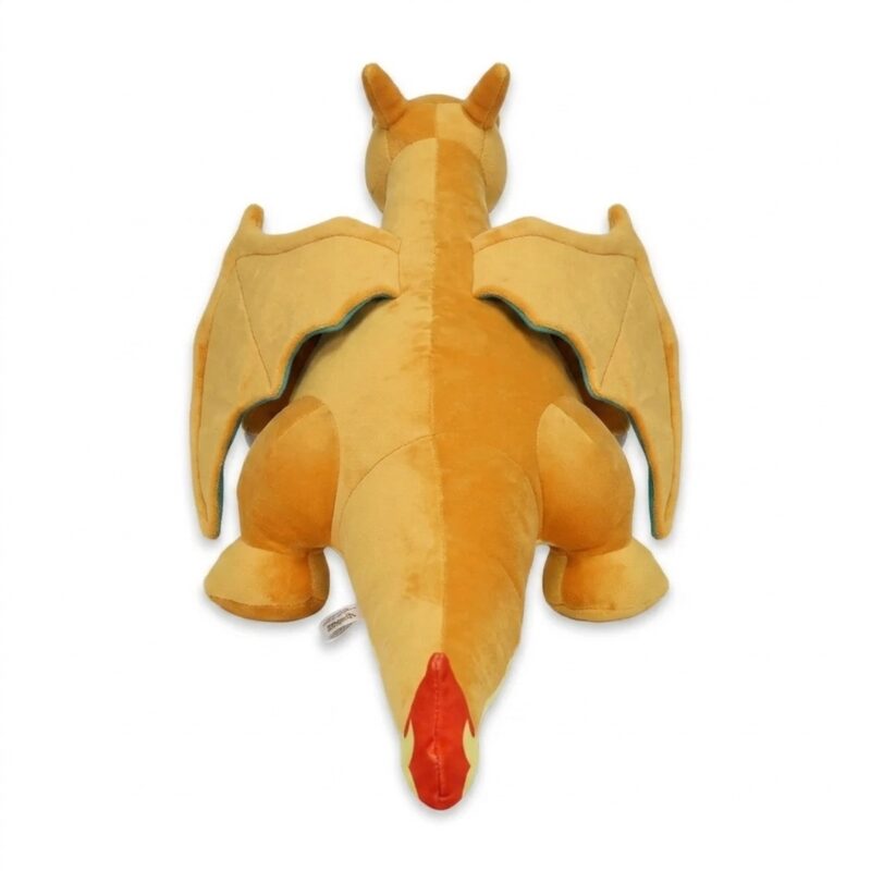 Peluche Charizard durmiendo vista de espalda