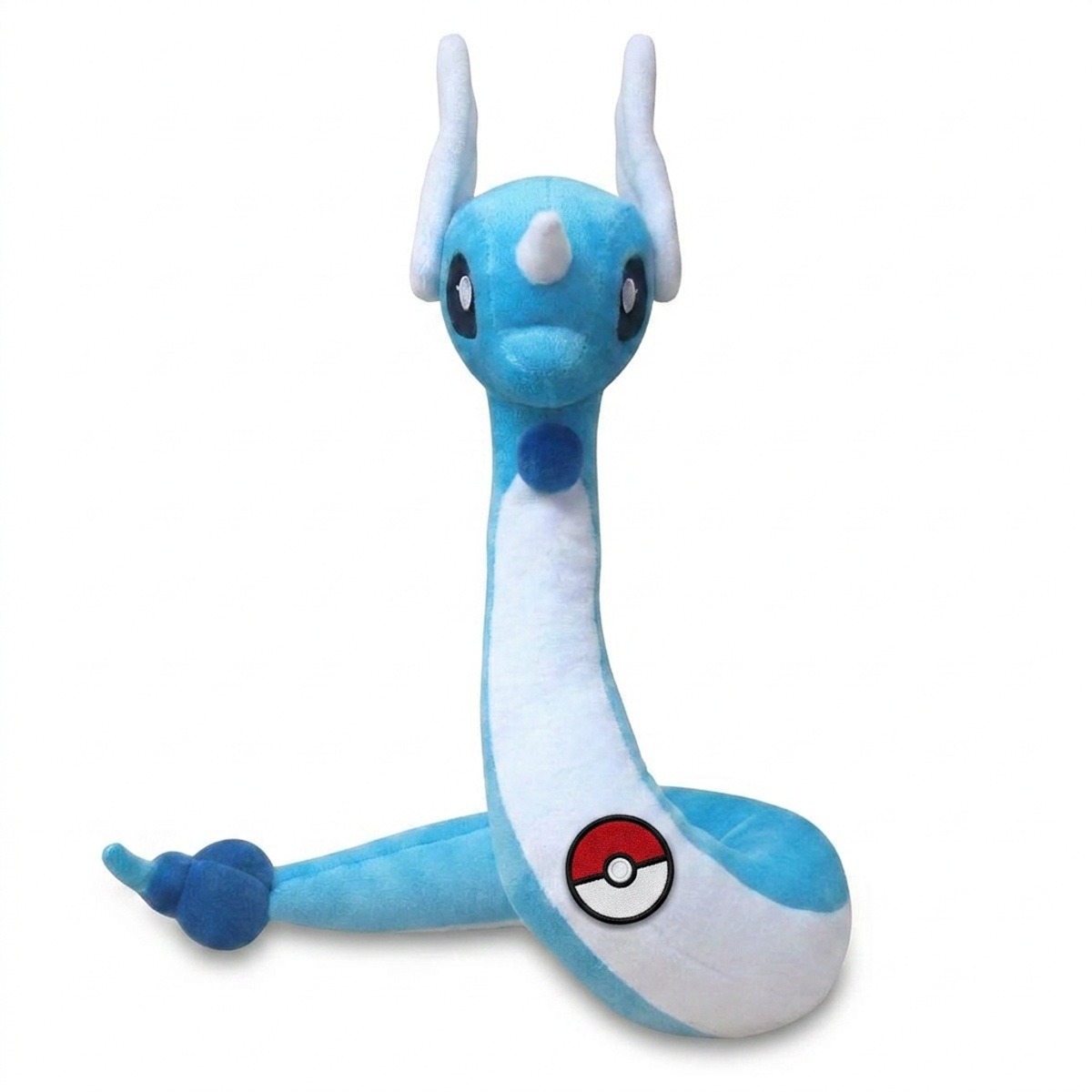 Dragonair Peluche con insignia que prueba la autenticidad del producto.