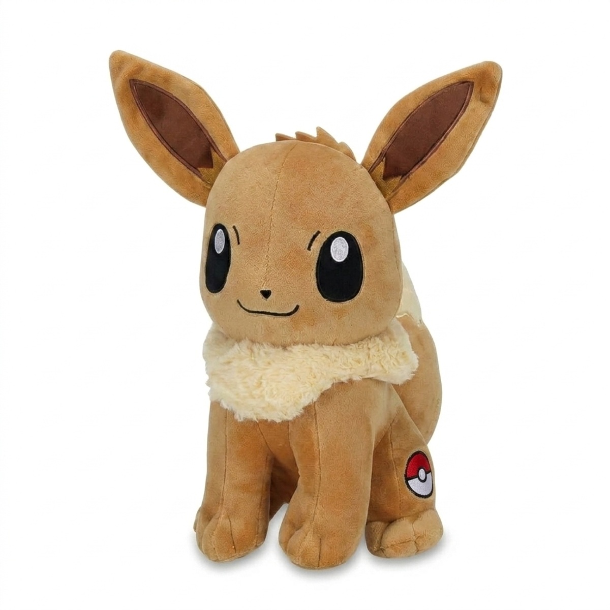 Eevee Peluche con insignia que prueba la autenticidad del producto.