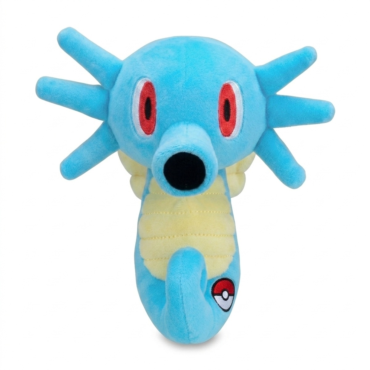 Horsea Peluche con insignia que prueba la autenticidad del producto.