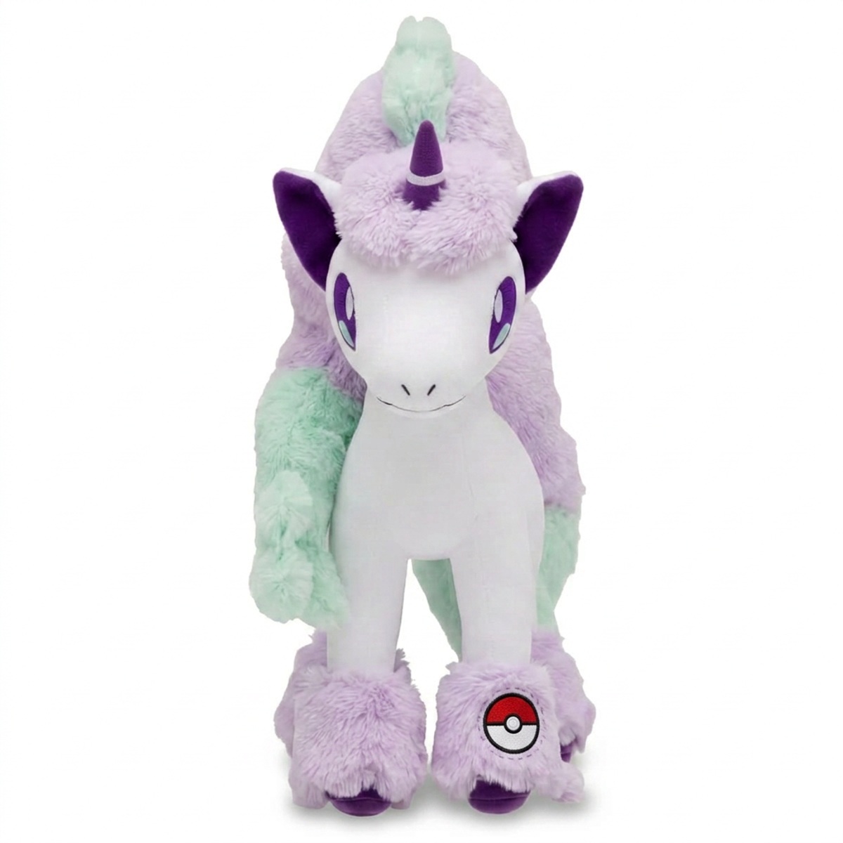 Ponyta Peluche con insignia que prueba la autenticidad del producto.