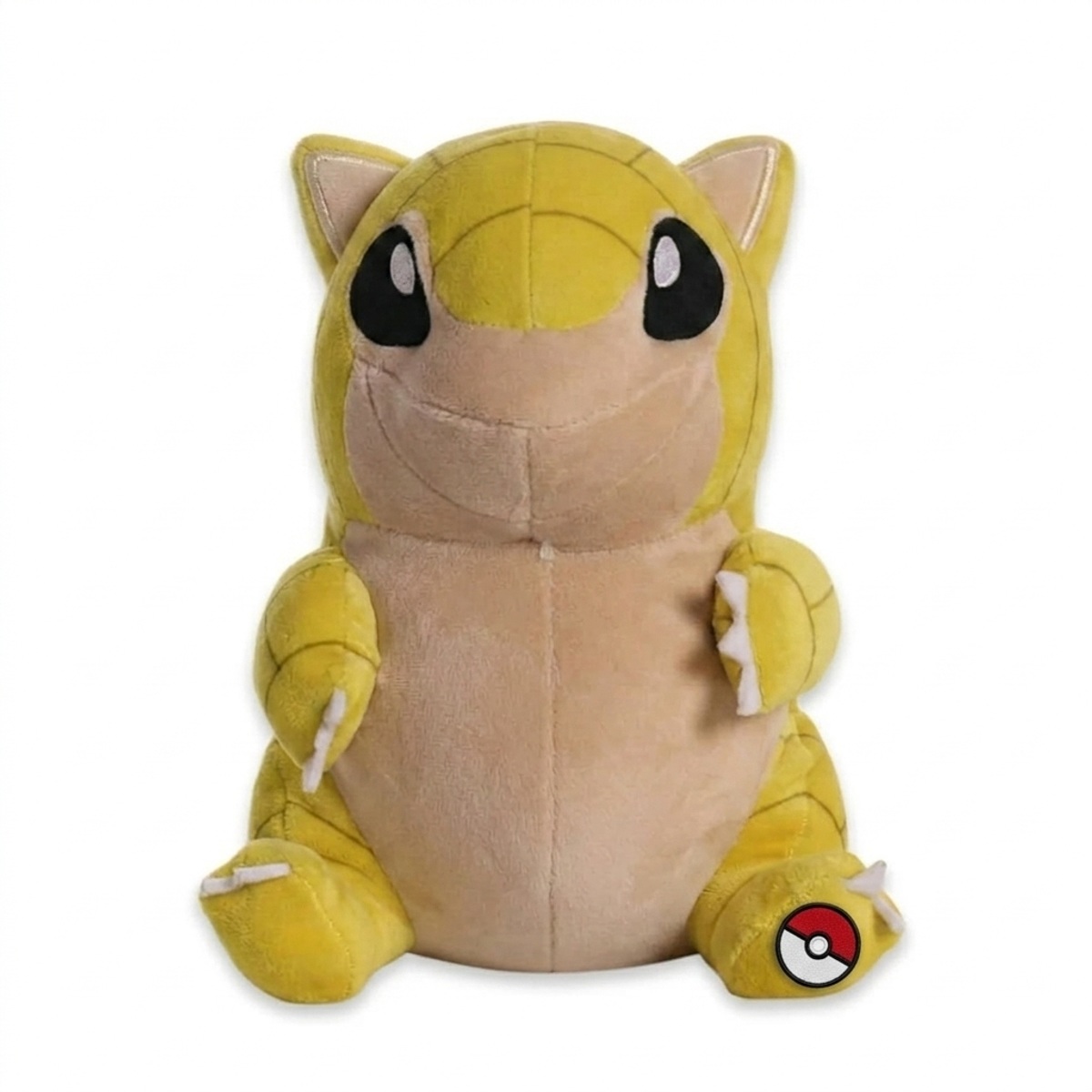 Sandshrew Peluche con insignia que prueba la autenticidad del producto.