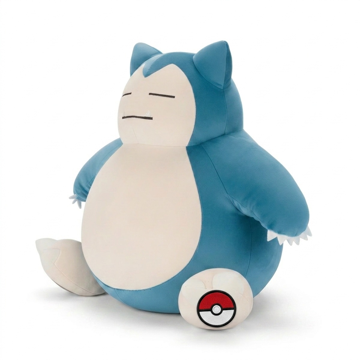 Snorlax Peluche con insignia que prueba la autenticidad del producto.
