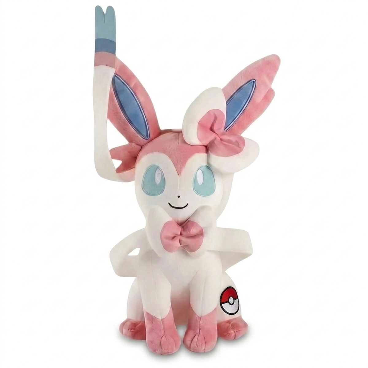 Sylveon Peluche con insignia que prueba la autenticidad del producto.