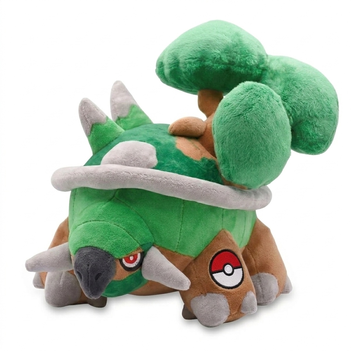 Torterra Peluche con insignia que prueba la autenticidad del producto.