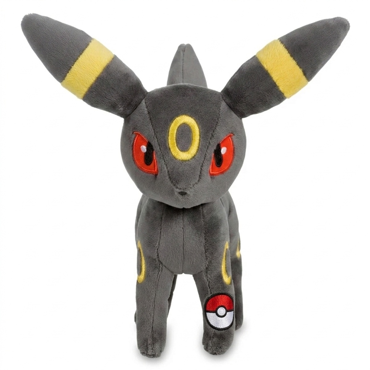 Umbreon Peluche con insignia que prueba la autenticidad del producto.
