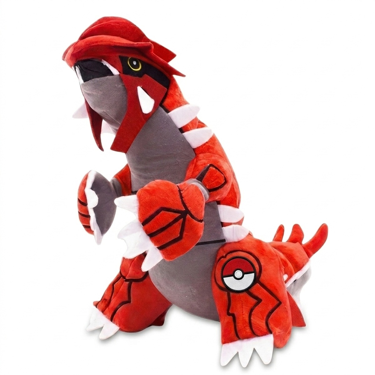 Groudon Peluche con insignia que prueba la autenticidad del producto.