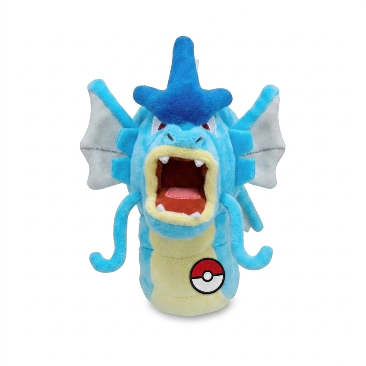Gyarados Peluche con insignia que prueba la autenticidad del producto.
