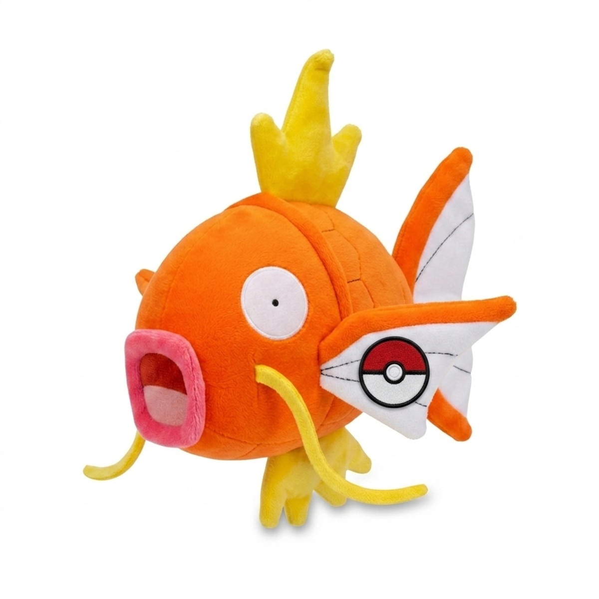 Magikarp Peluche con insignia que prueba la autenticidad del producto.