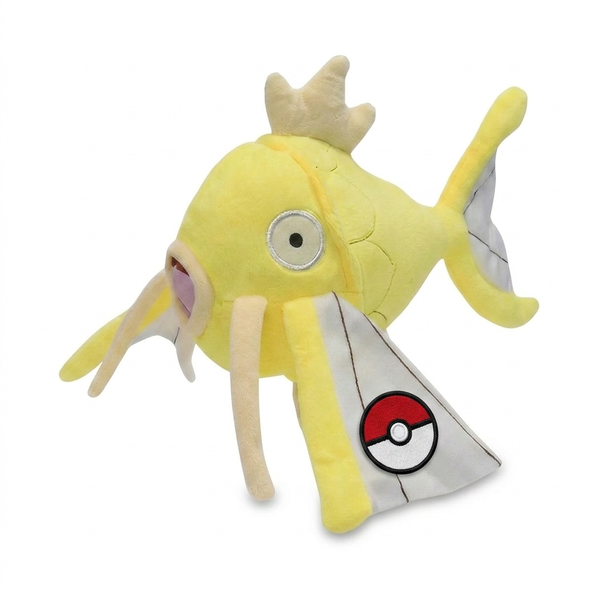 Magikarp Peluche con insignia que prueba la autenticidad del producto.