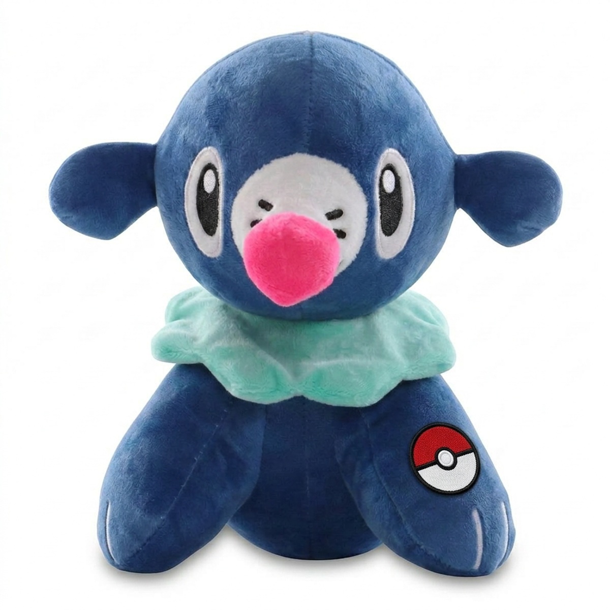 Popplio Peluche con insignia que prueba la autenticidad del producto.