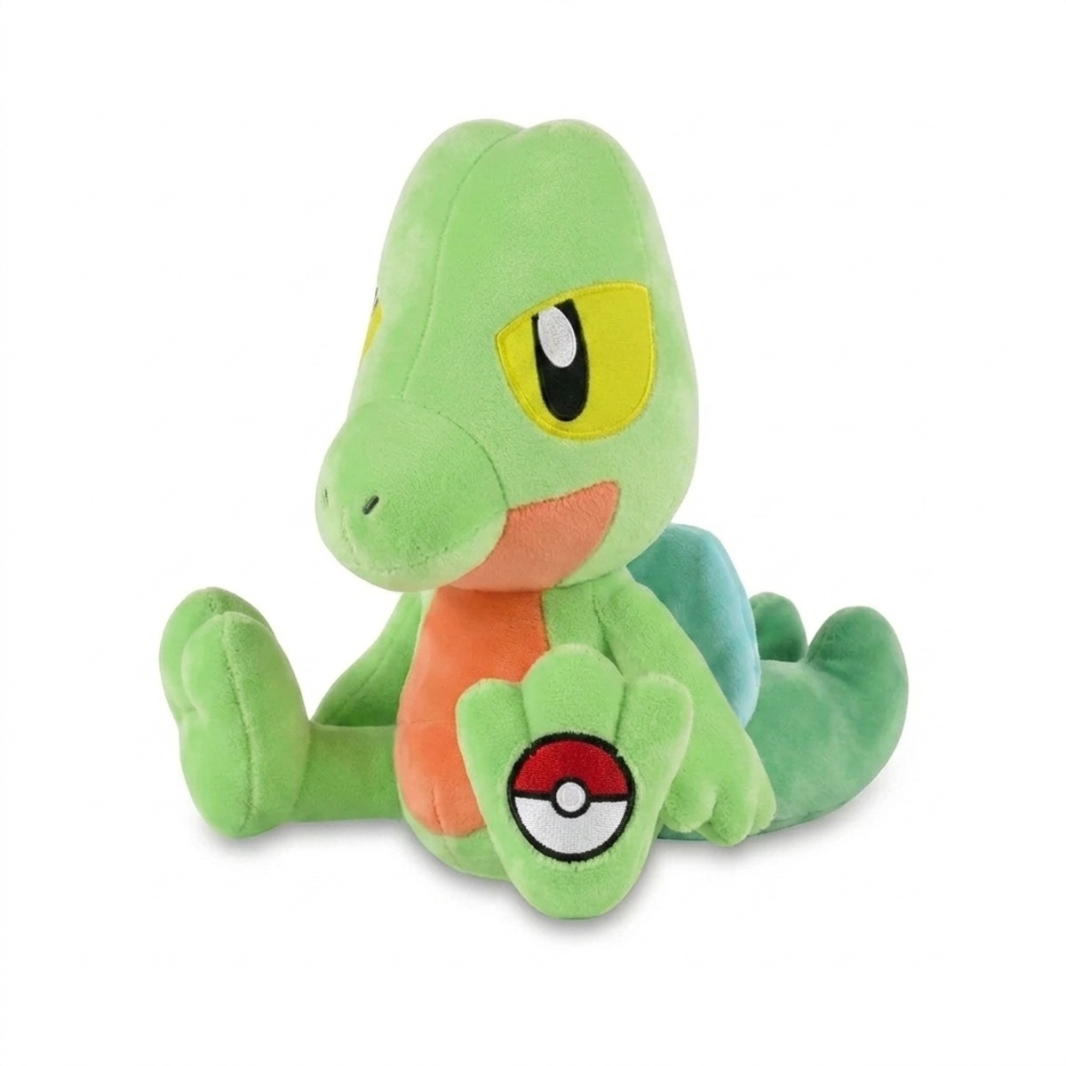 Treecko Peluche con insignia que prueba la autenticidad del producto.