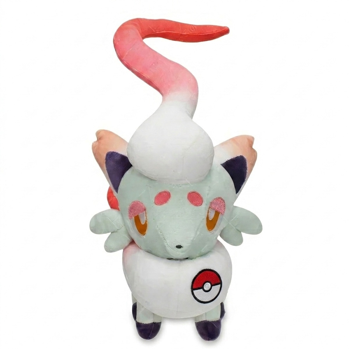 Zorua Peluche con insignia que prueba la autenticidad del producto.