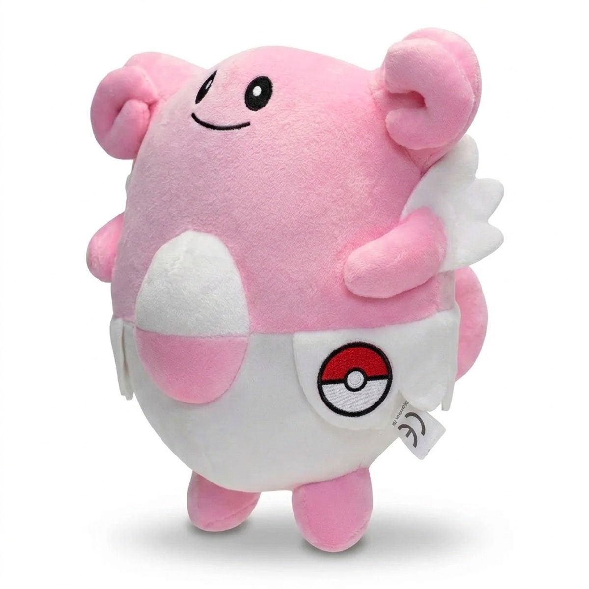 Blissey Peluche con insignia que prueba la autenticidad del producto.