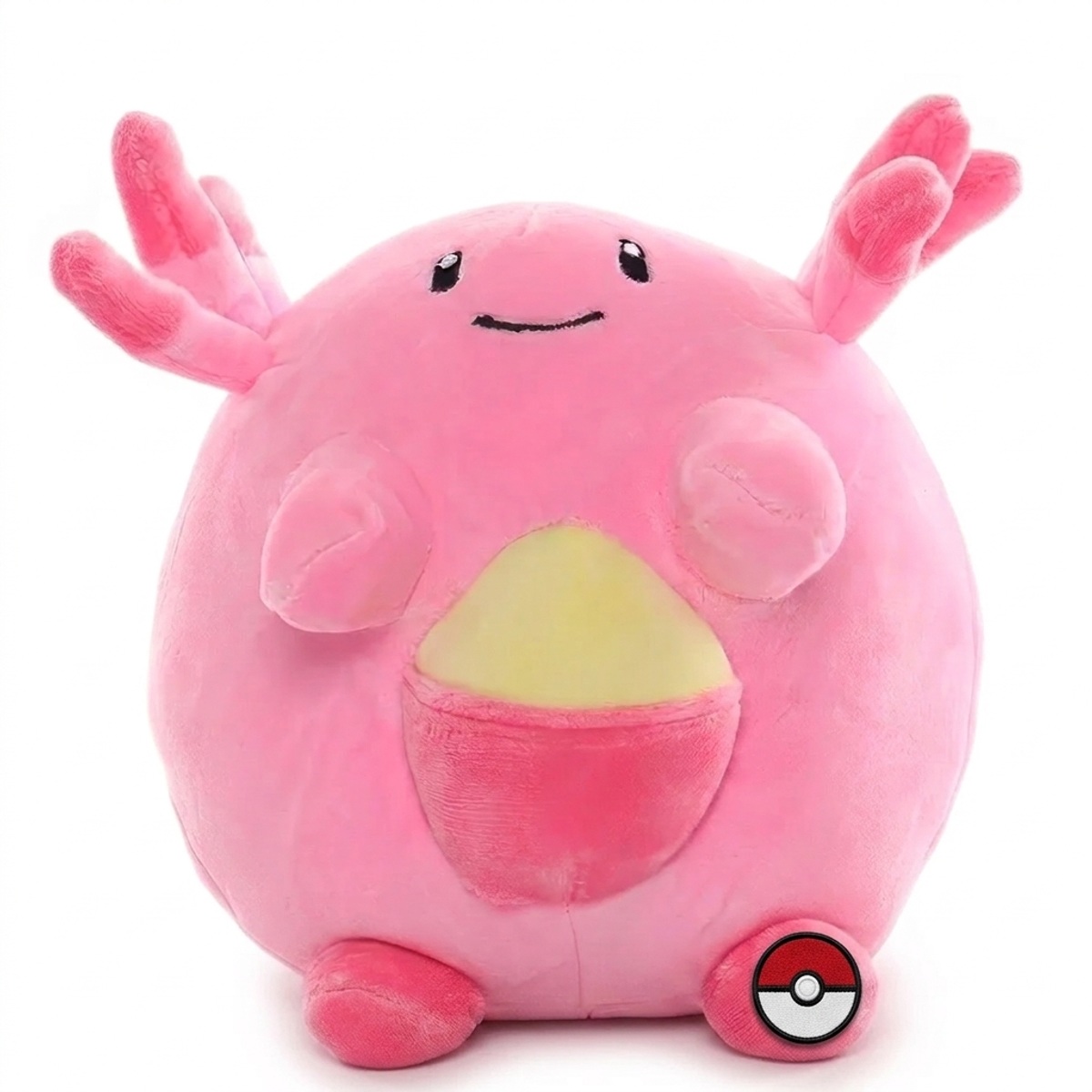 Chansey Peluche con insignia que prueba la autenticidad del producto.