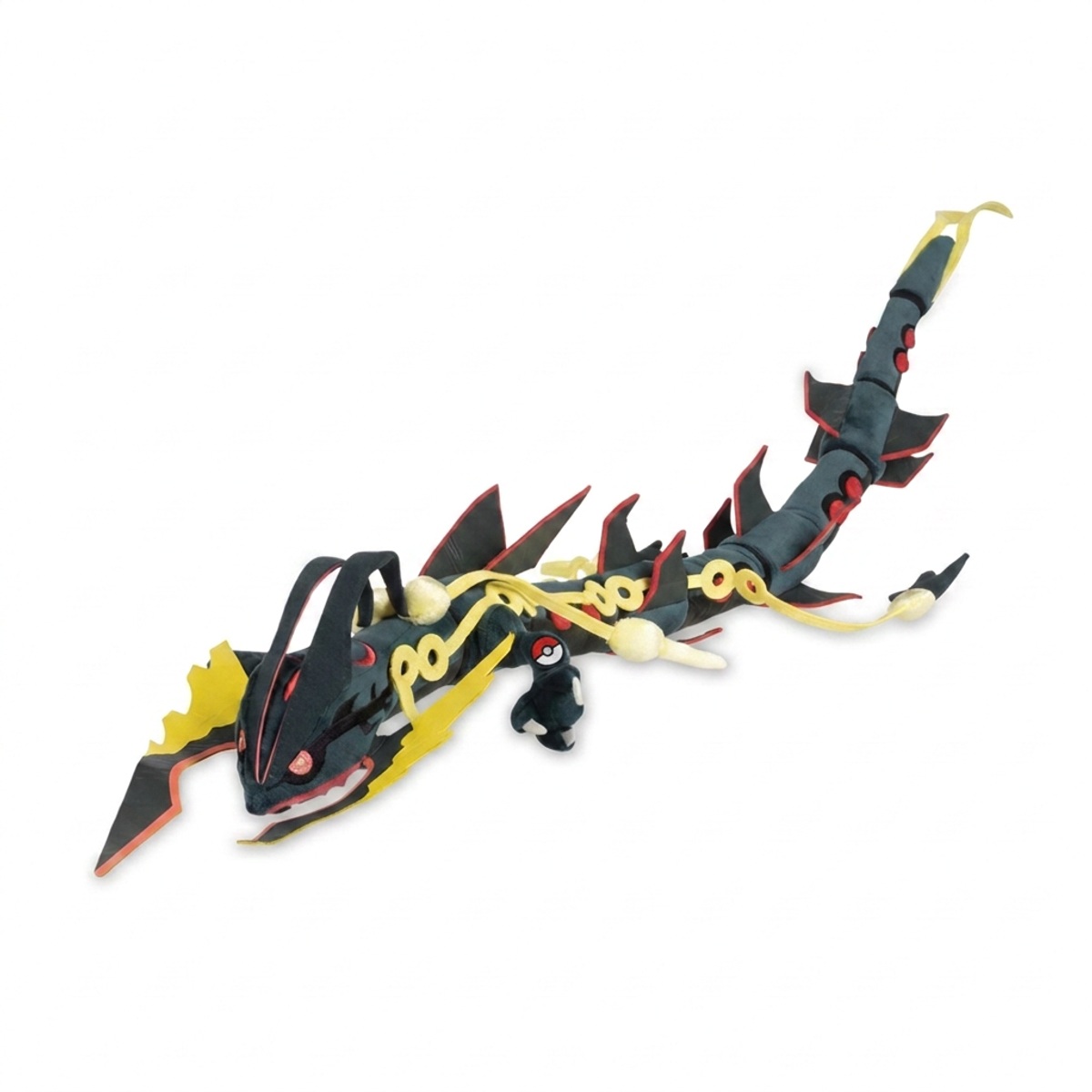 Mega Rayquaza Shiny Peluche con insignia que prueba la autenticidad del producto.