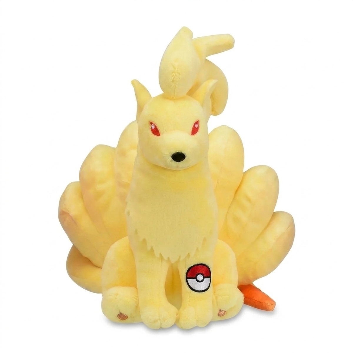 Ninetales Peluche con insignia que prueba la autenticidad del producto.