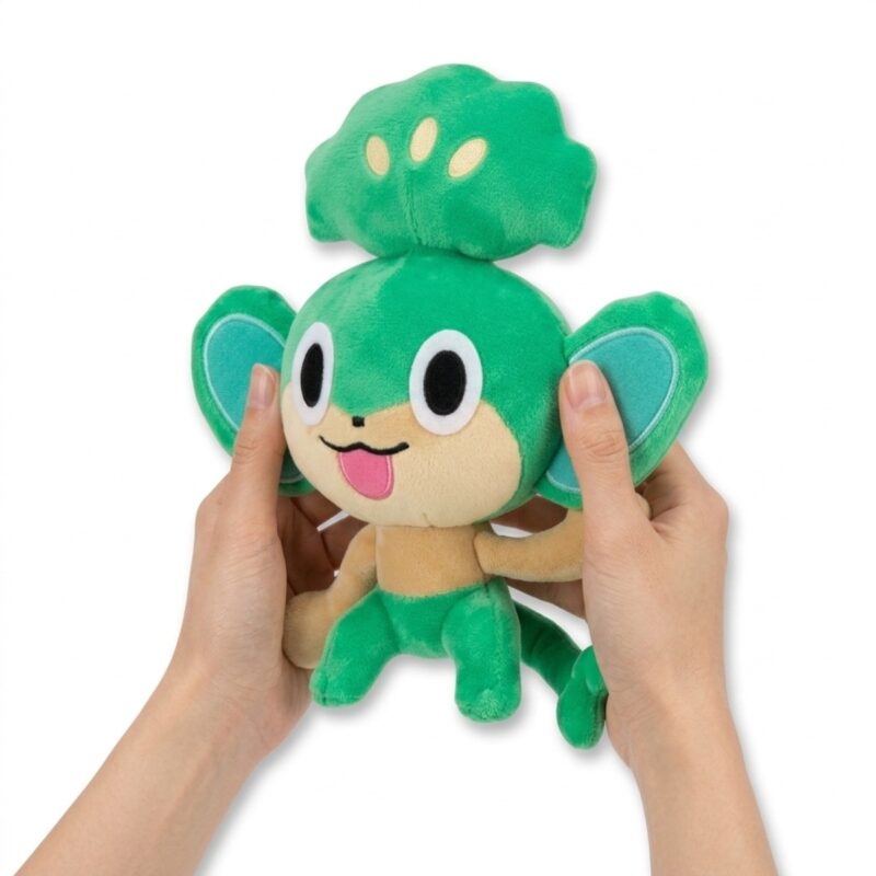 Pansage Peluche en las manos