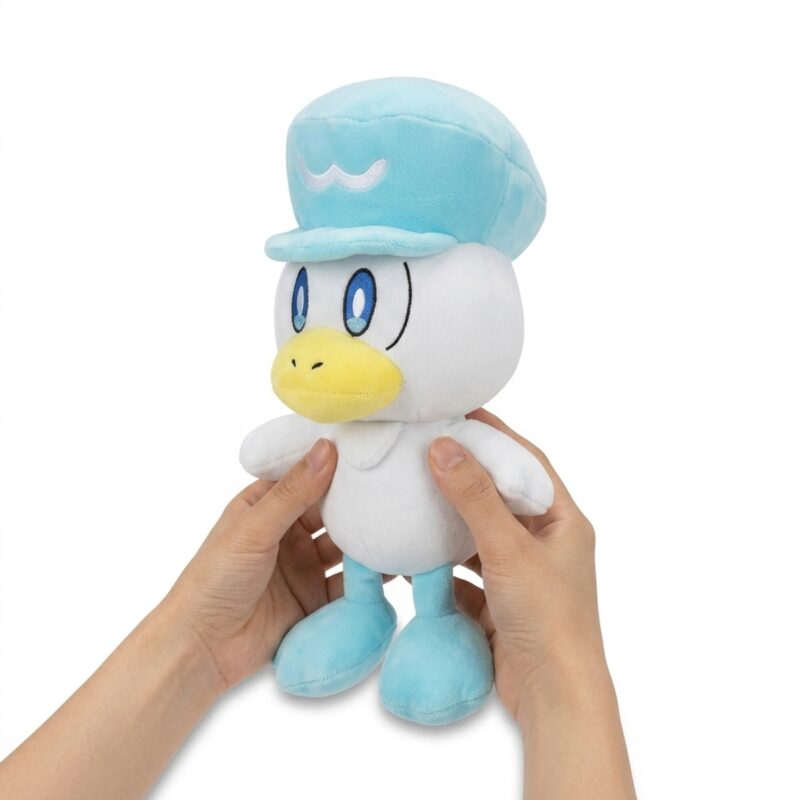 Quaxly Peluche sostenida en las manos