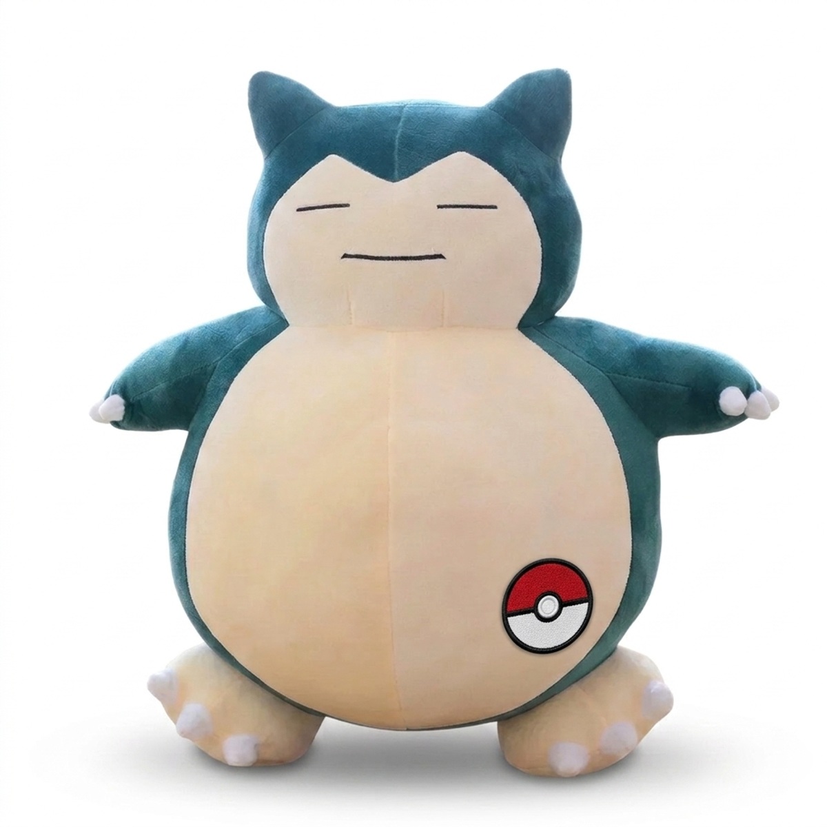 Snorlax Gigante Peluche con insignia que prueba la autenticidad del producto.