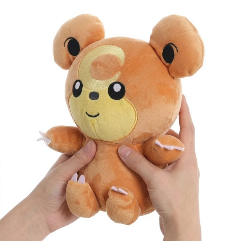Teddiursa Peluche sostenido en las manos