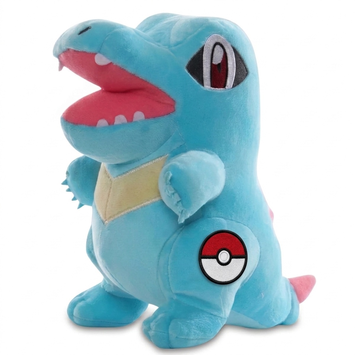 Totodile Peluche con insignia que prueba la autenticidad del producto.
